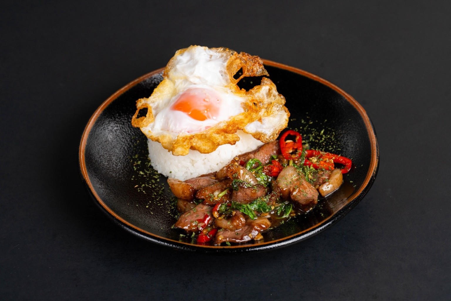 กะเพราพิคานย่า Dry-Aged ราดข้าว เพิ่มไข่ดาว